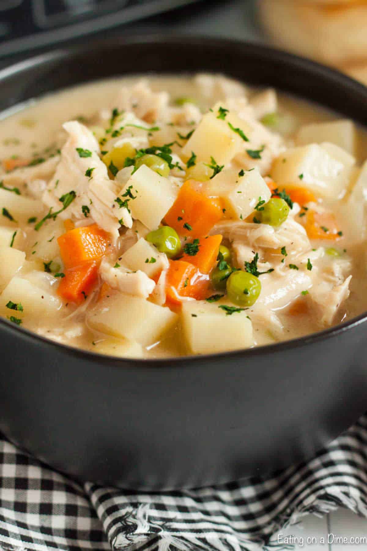 Chicken pot pie with diced potatoes, carrots and peas