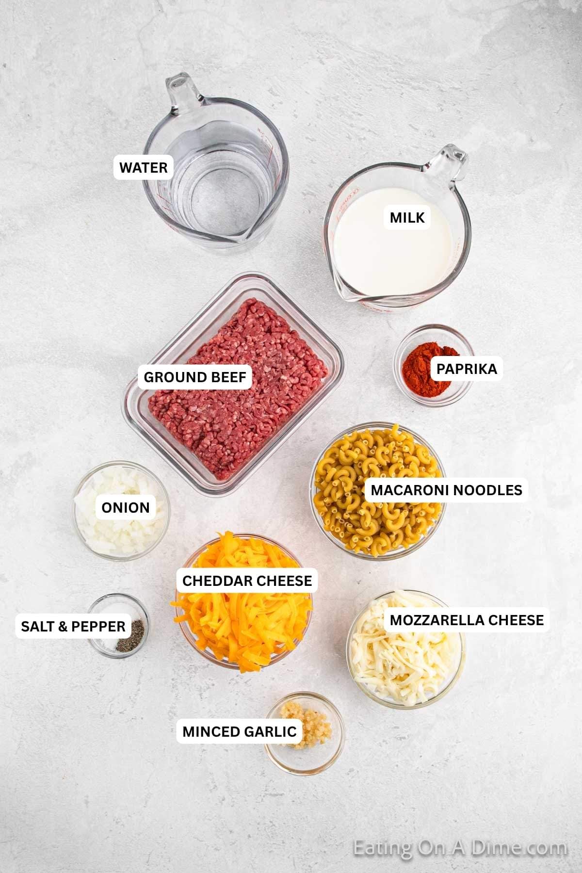 Ingredients for recipe: ground beef, paprika, water, milk, macaroni noodles, onion, cheese, salt, pepper and garlic.