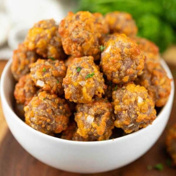 Sausage balls in a white bowl.