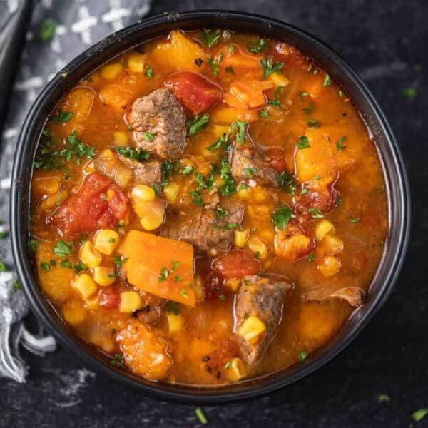 Close up of a bowl of sweet potato stew.