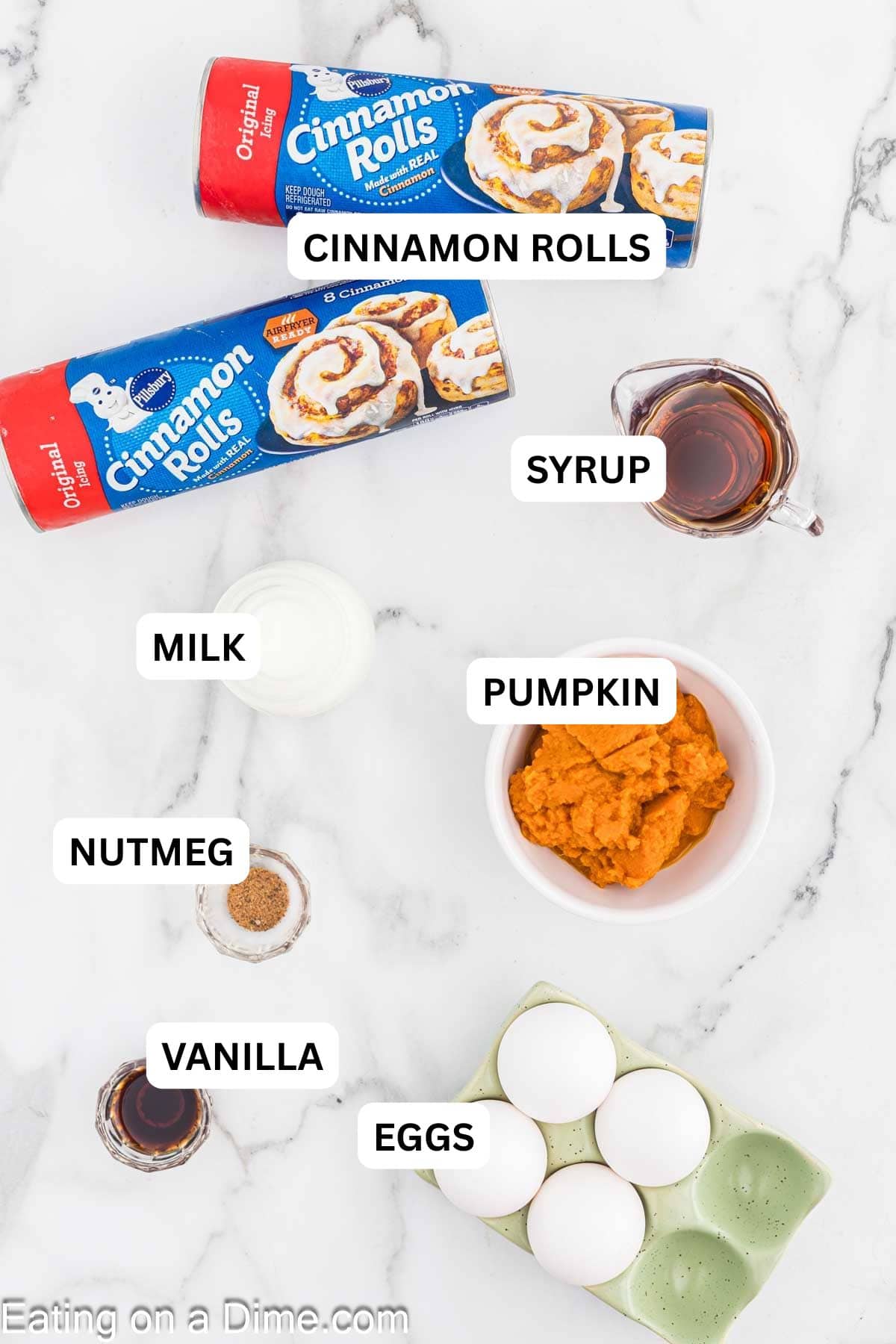 Ingredients needed for this recipe includes Canned cinnamon rolls, maple syrup, canned pumpkin, eggs, pumpkin spice, and vanilla.