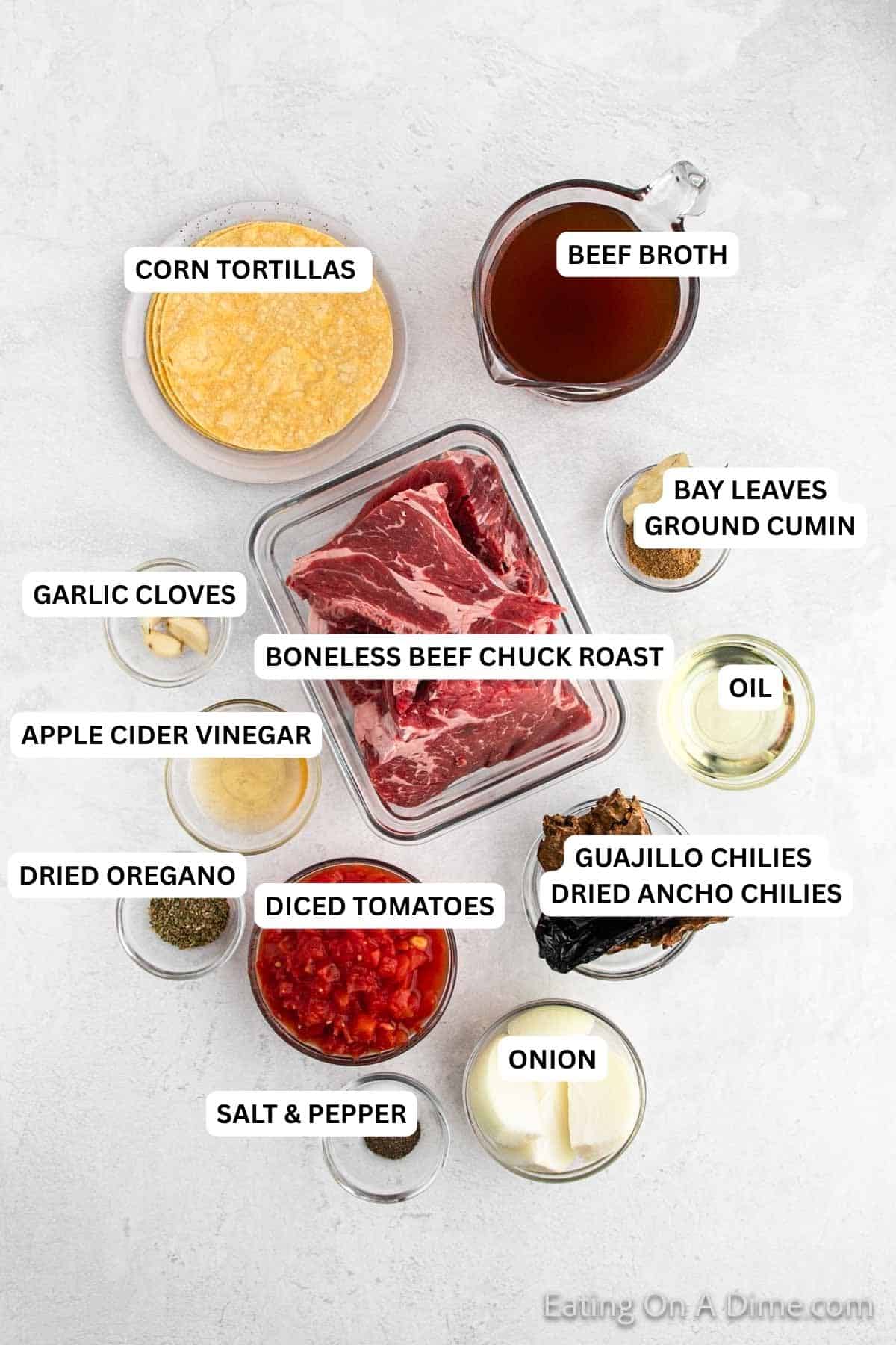 Ingredients for recipe: beef broth, corn tortillas, bay leaves, ground cumin, garlic cloves, boneless beef chuck roast, oil, apple cider vinegar,, oil, dried oregano, diced tomatoes, chilies.