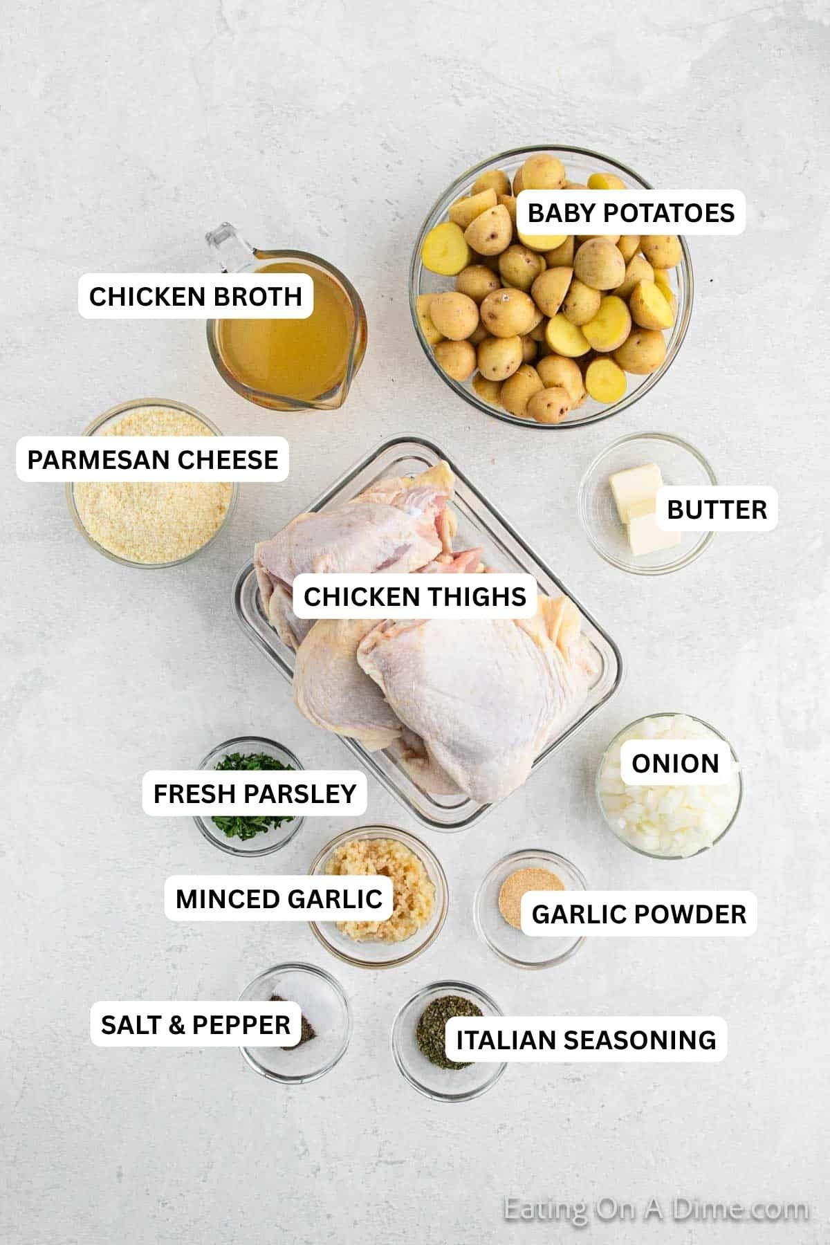 Ingredients for recipe: baby potatoes, chicken broth, parmesan cheese, butter, chicken thighs, parsley, garlic, garlic powder, salt, pepper and Italian seasoning.