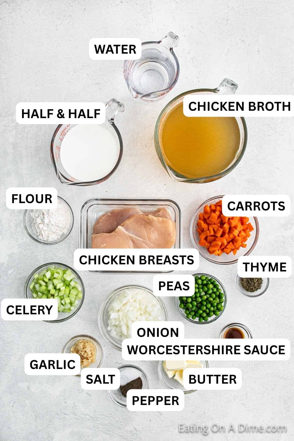 Ingredients needed to make this recipe which include chicken breasts, chicken broth, chopped carrots, celery, peas, onion and more.