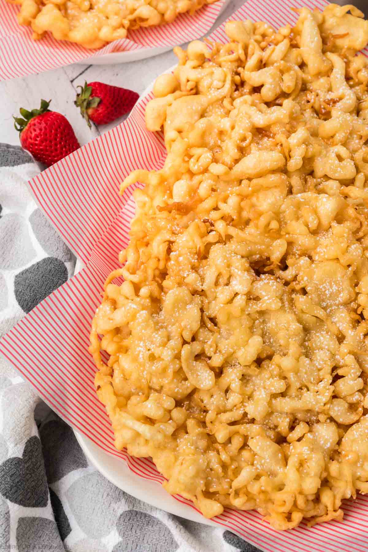 Funnel Cake stacked on a plate 