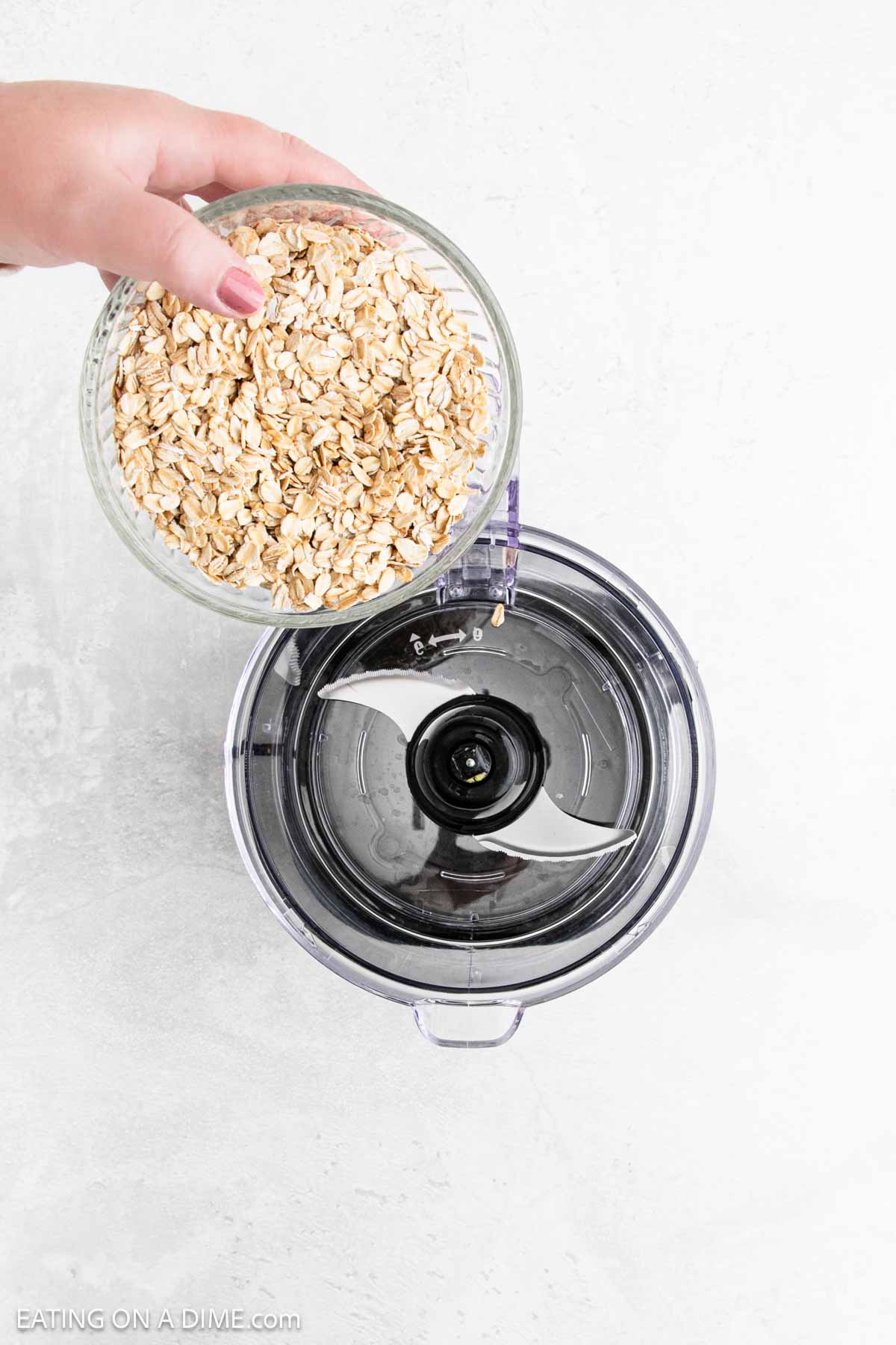 Pouring oats in the food processor