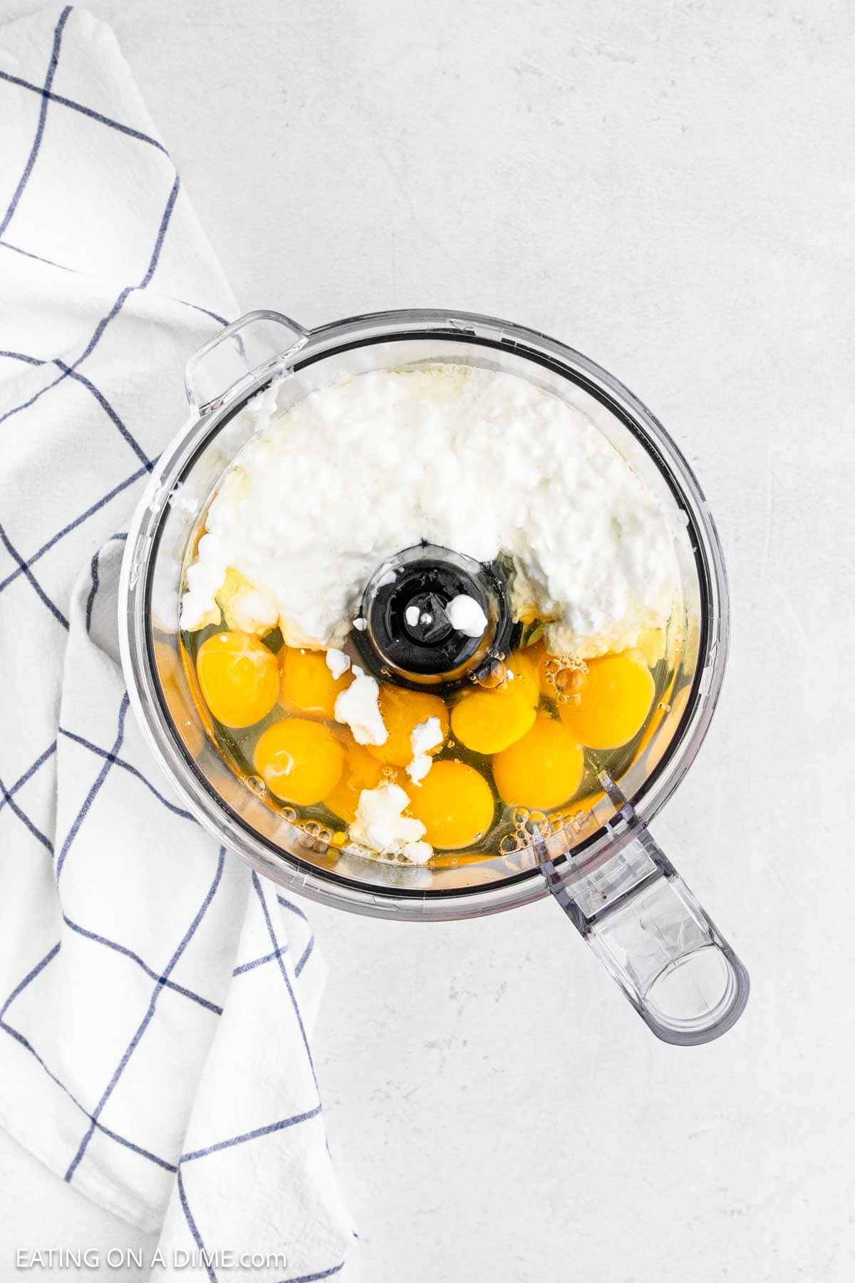 Cottage cheese and eggs in a food processor