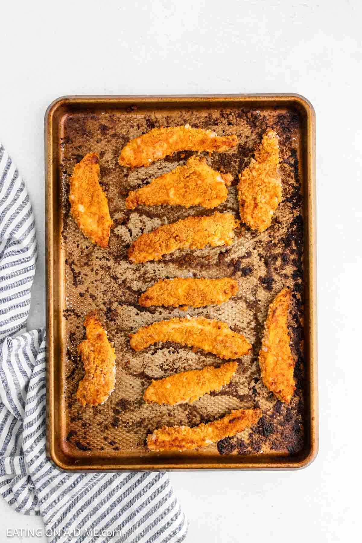 Oven Fried Chicken Tenders on a baking sheet