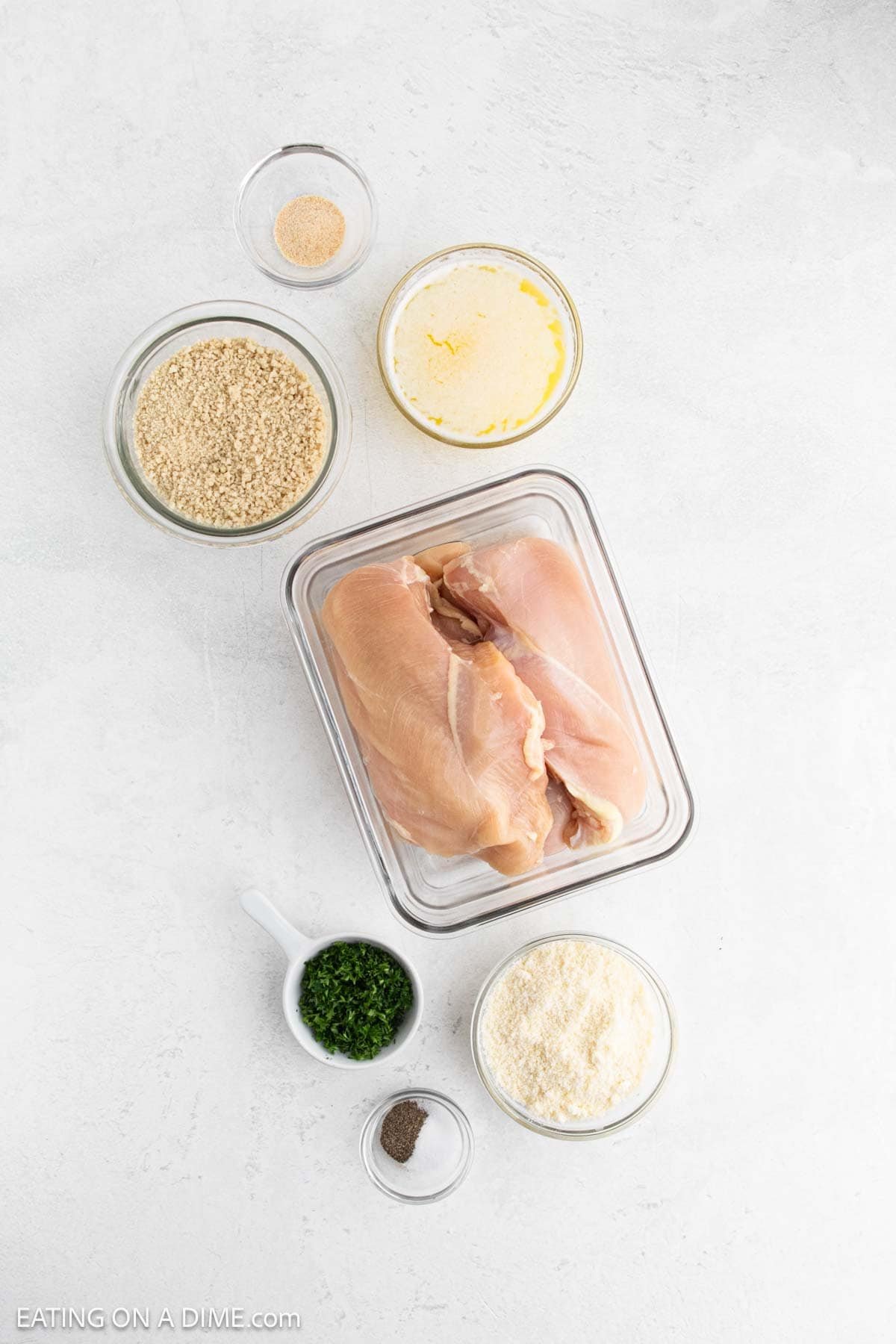 Ingredients - Chicken, butter, breadcrumbs, parmesan cheese, parsley, salt, pepper, garlic powder
