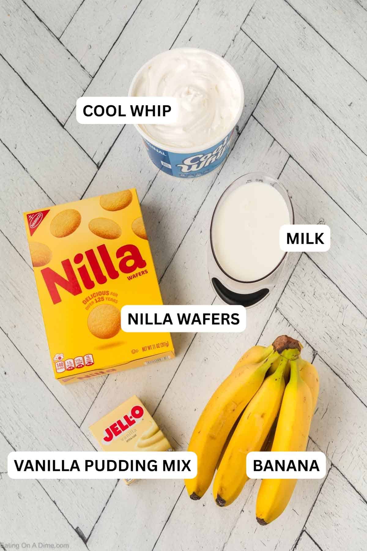 Ingredients, vanilla pudding mix, bananas, nilla wafers, milk, and cool whip.