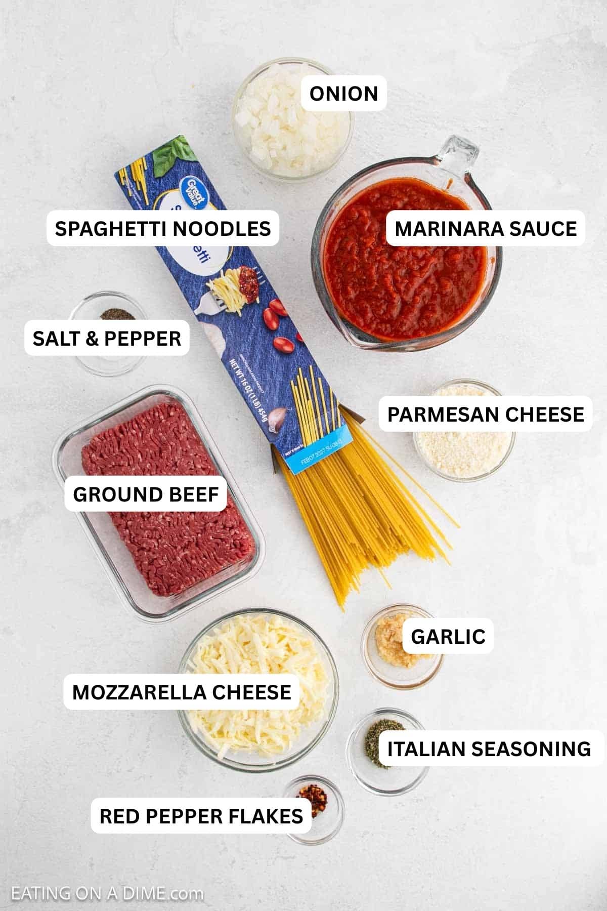 Ingredients for recipe: Spaghetti noodles, ground beef, onion, garlic, marinara sauce, Italian seasoning, salt, pepper, red pepper flakes, mozzarella cheese and parmesan cheese.