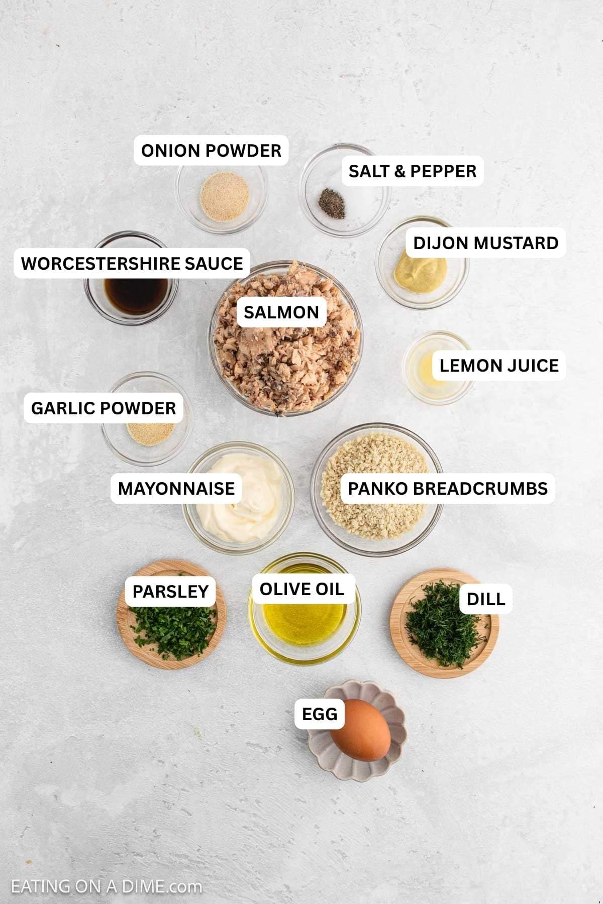 Ingredients for recipe: onion powder, salt & pepper, Worcestershire sauce, Dijon Mustard, salmon, lemon juice, garlic powder, mayonnaise, panko breadcrumbs, parsley, olive oil, egg and dill.