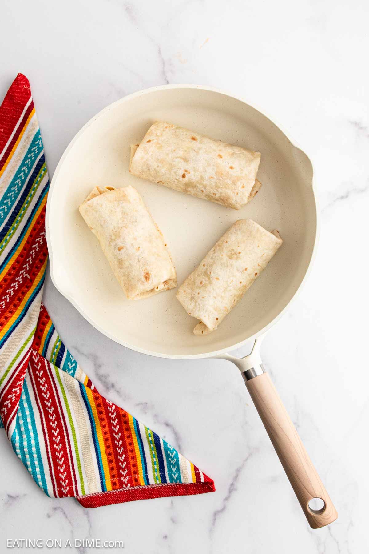 Wrapped burritos in the skillet