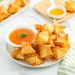 Chinese style wonton soup with wonton chips.