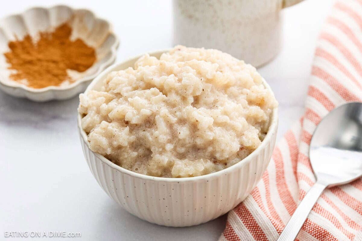 A bowl of creamy rice pudding, gently cooked to perfection in a slow cooker.