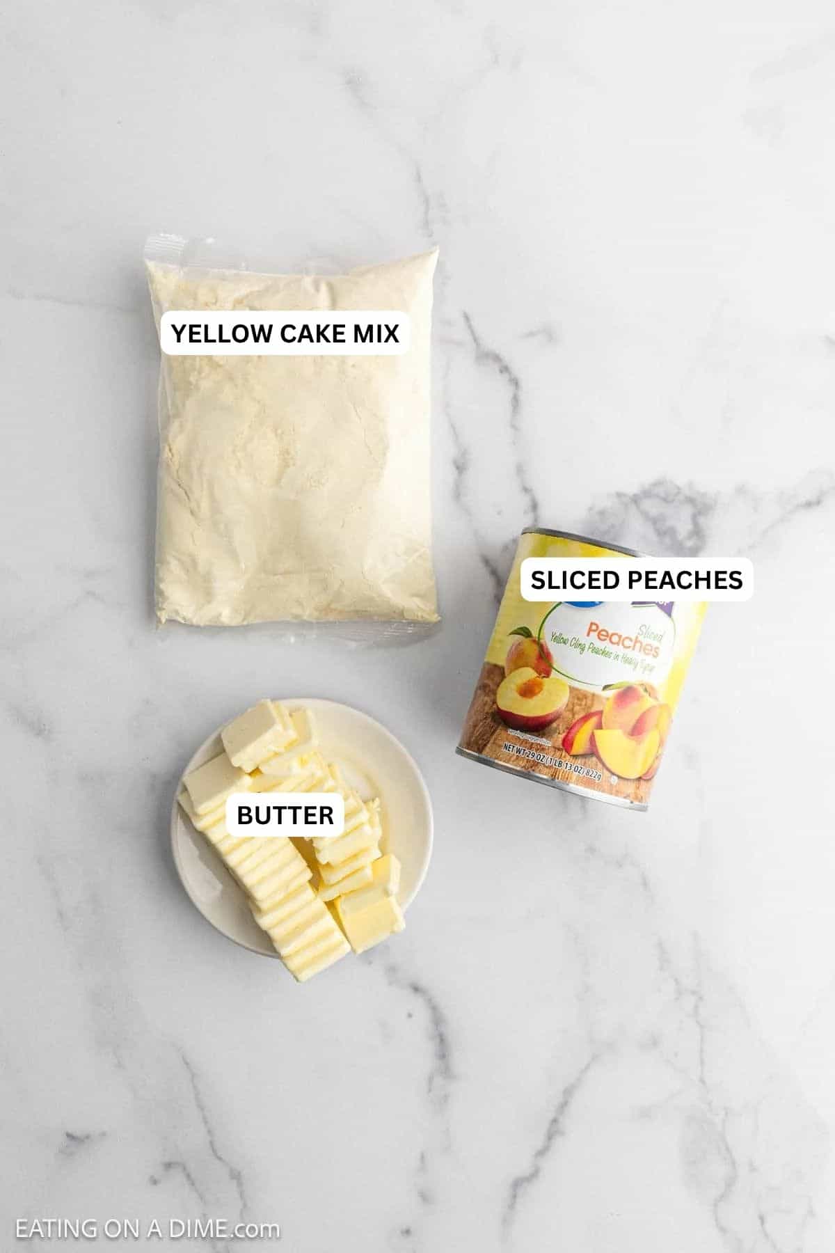 Ingredients for recipe: yellow cake mix, sliced peaches and butter.