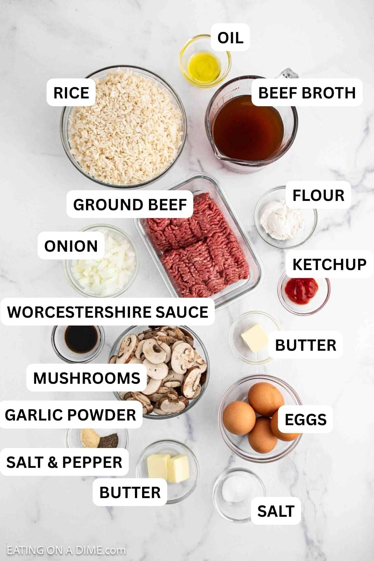 Ingredients needed to make this recipe which includes ground beef, eggs, rice, butter, onion, mushrooms, beef broth, worcestershire sauce, ketchup, flour, oil, spices and green onions.