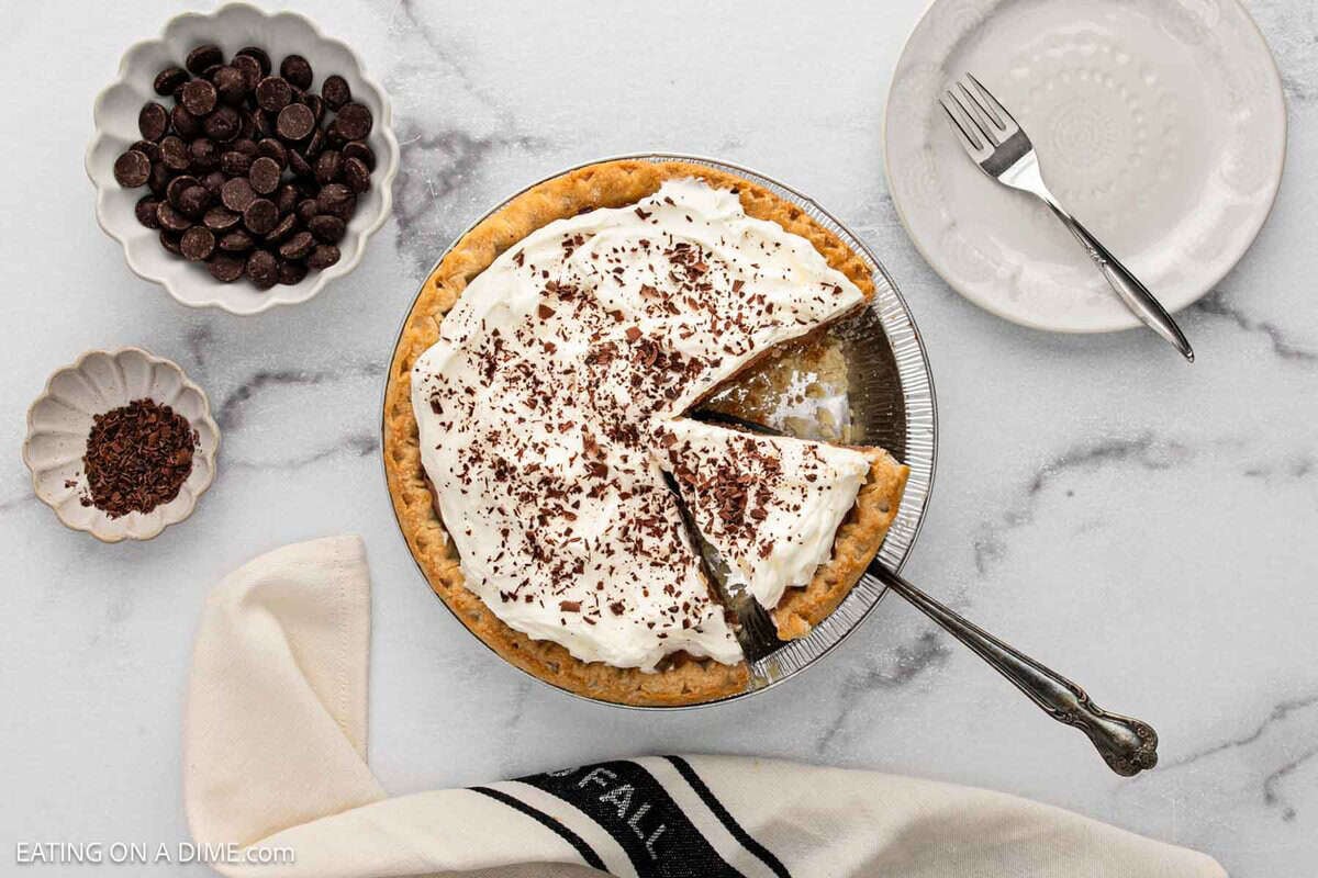 A French Silk Pie with a slice cut out.