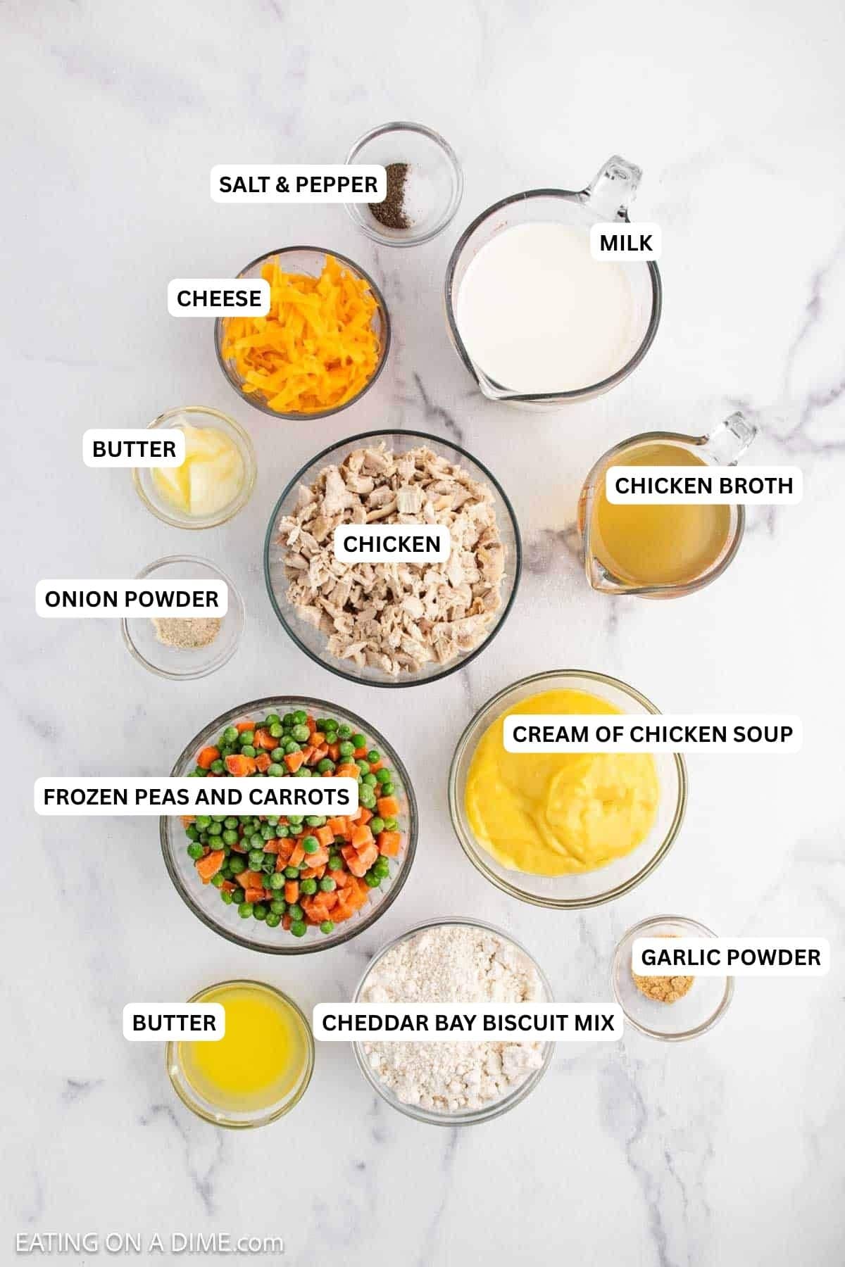 Ingredients for recipe: chopped cooked chicken, mixed vegetables, shredded cheese, milk, chicken broth, melted butter, flour, seasonings, and cream of chicken soup.