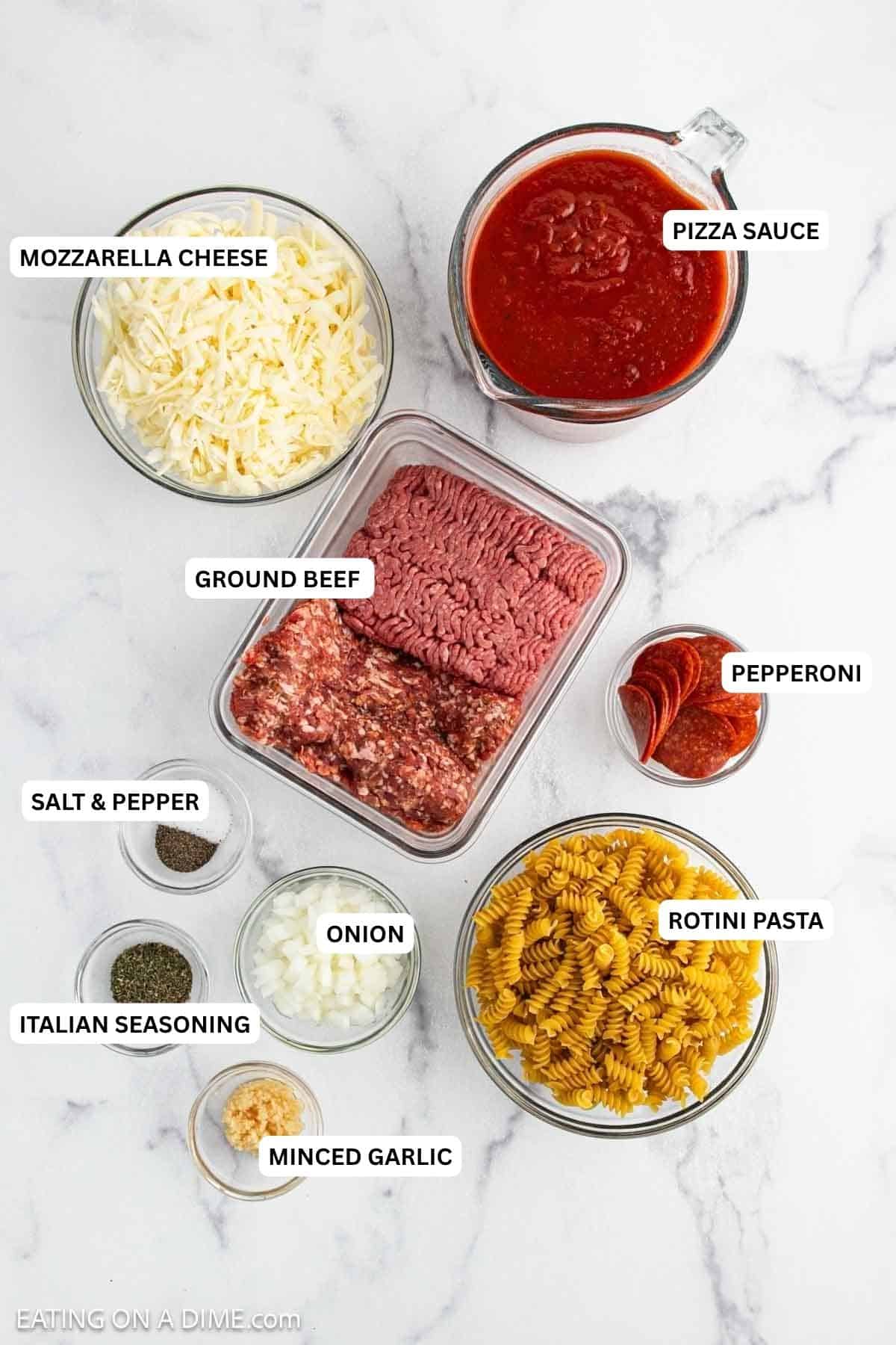 Ingredients for recipe: minced garlic, pasta, onion, Italian seasoning, pepperoni, ground beef, pizza sauce and mozzarella cheese.