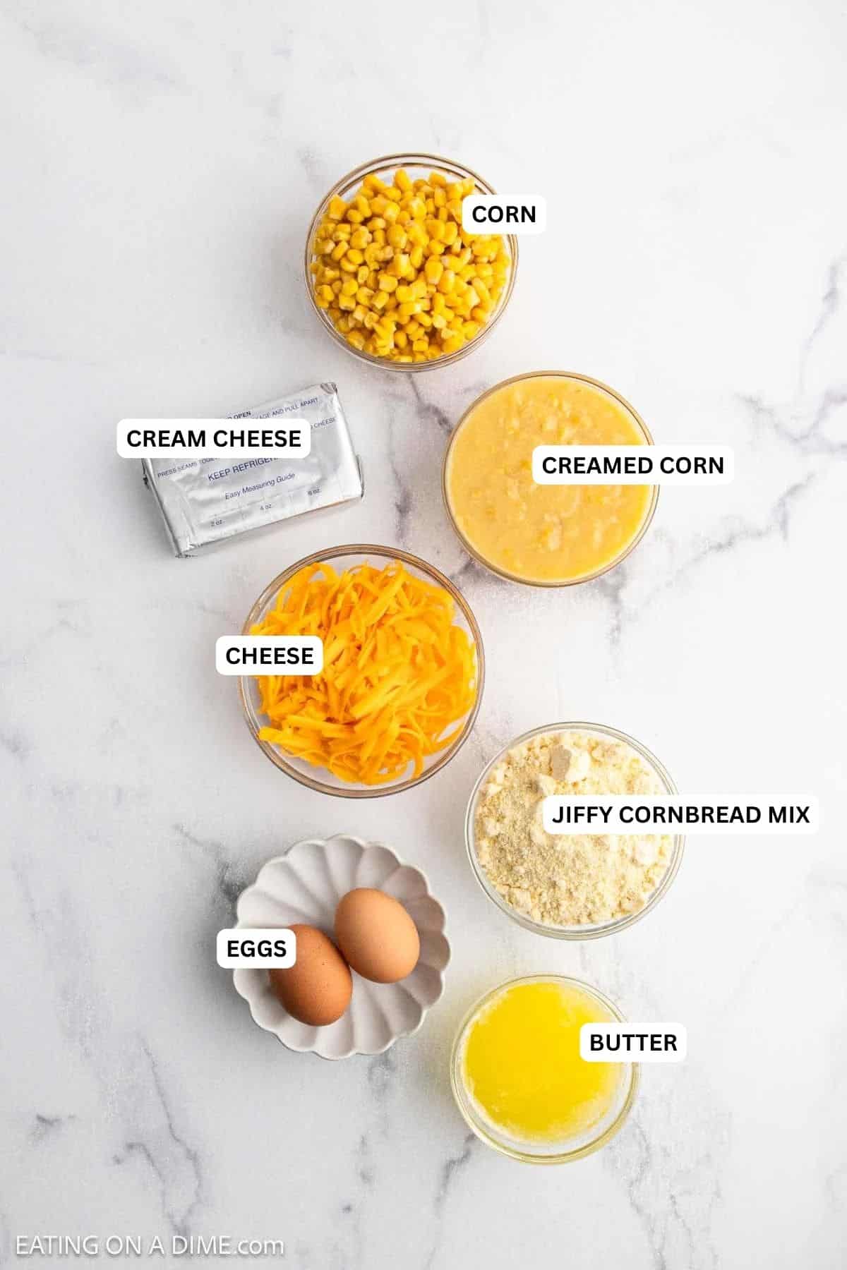 Ingredients for recipe: cream cheese, corn, cheese, Jiffy cornbread, butter, eggs.