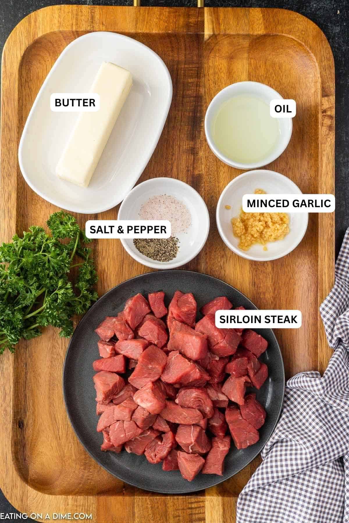 Ingredients for recipe: sirloin steak, salt, pepper, butter and minced garlic.