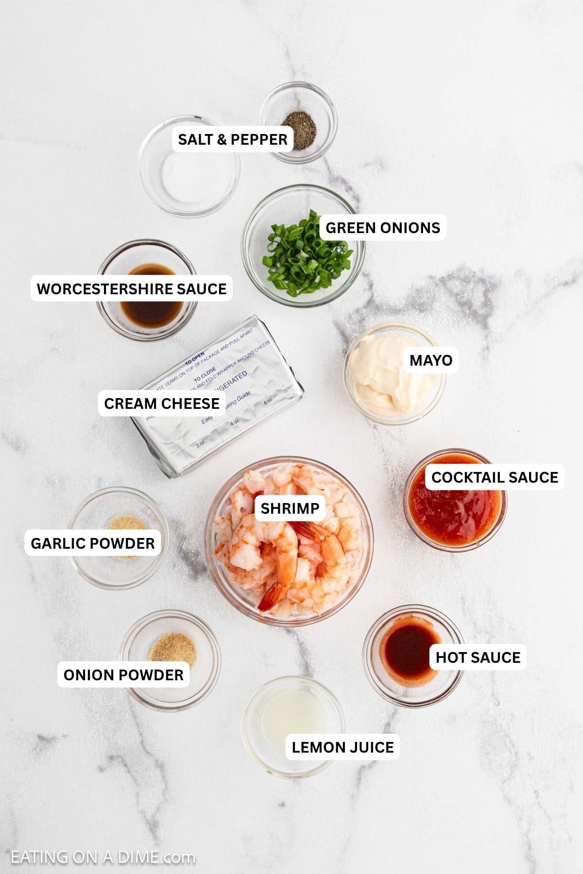 Ingredients for recipe: green onion, Worcestershire sauce, mayo, cream cheese, cocktail sauce, garlic powder, shrimp, salt, pepper, lemon juice and hot sauce.