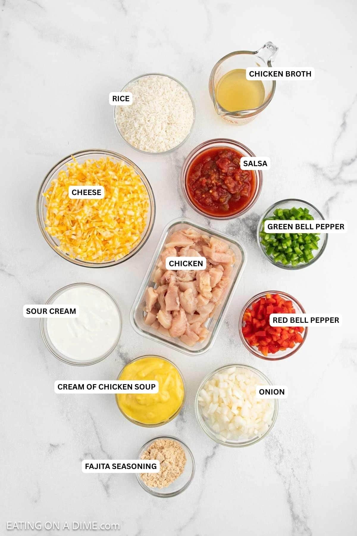 Ingredients for recipe: fajita seasoning, onion, cream of chicken soup, red bell pepper, chicken, sour cream, green bell pepper, cheese, salsa, rice and chicken broth.