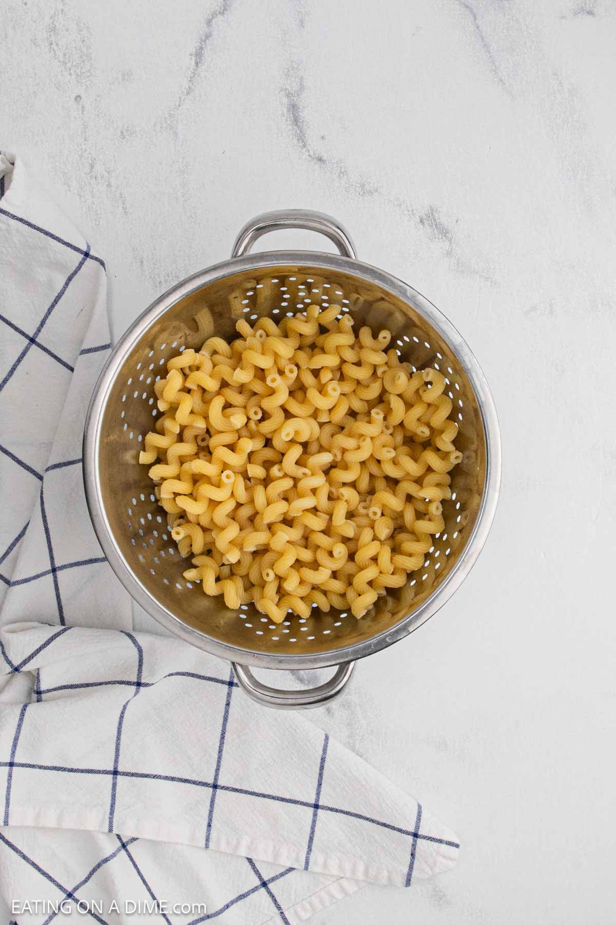 Pasta in a strainer.
