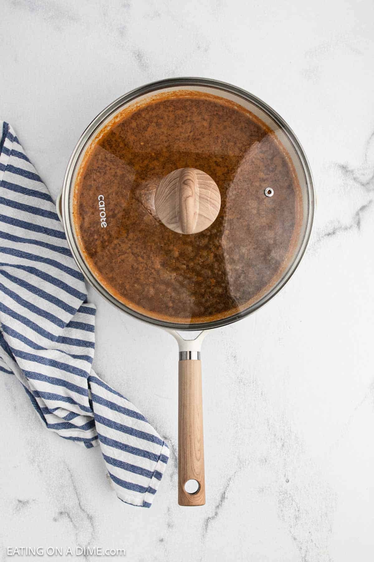 Large skillet covered with a lid.