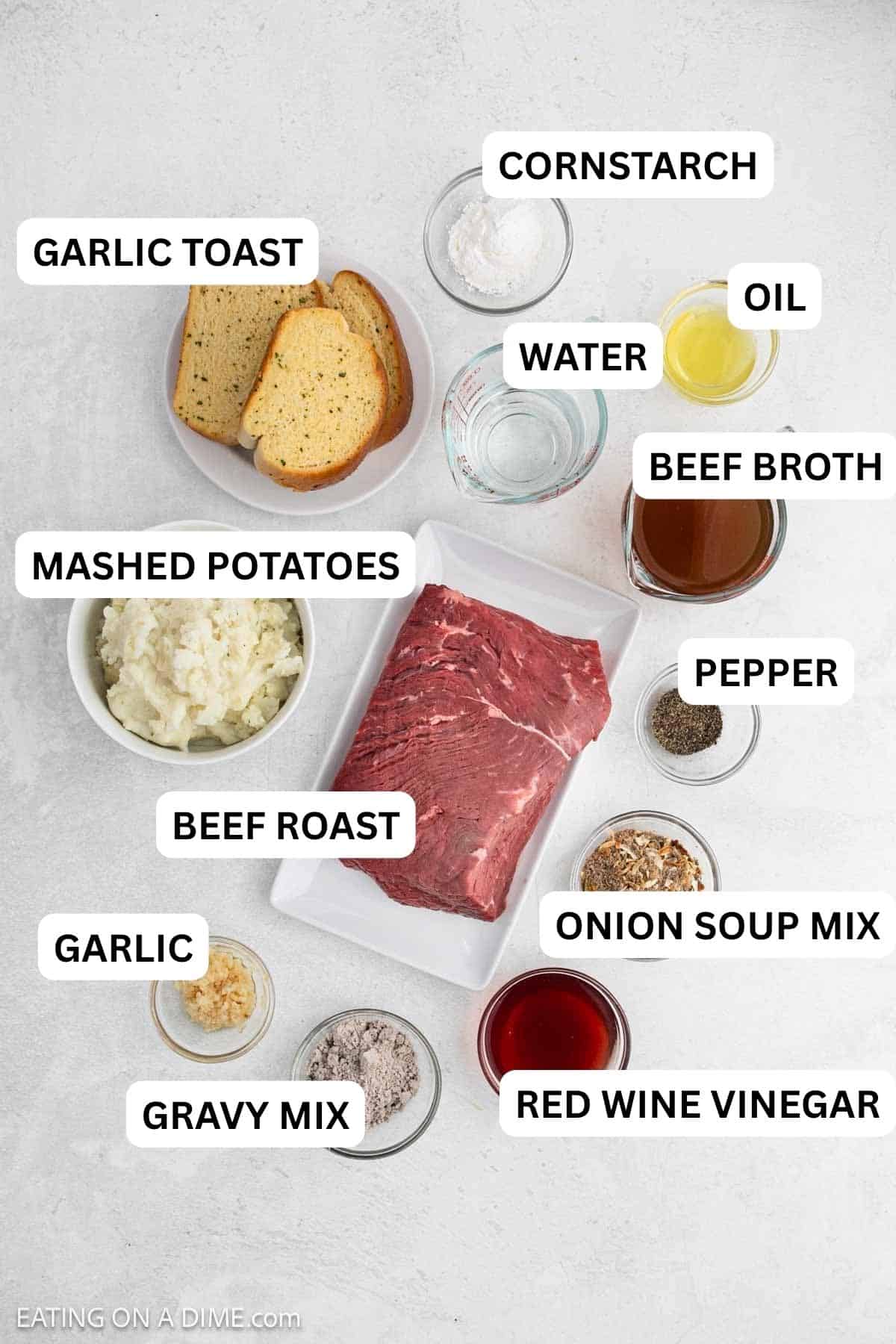 Ingredients needed to make this recipe includes beef roast, gravy mix, onion soup mix, red wine vinegar, beef broth, garlic, mashed potatoes and garlic toast.