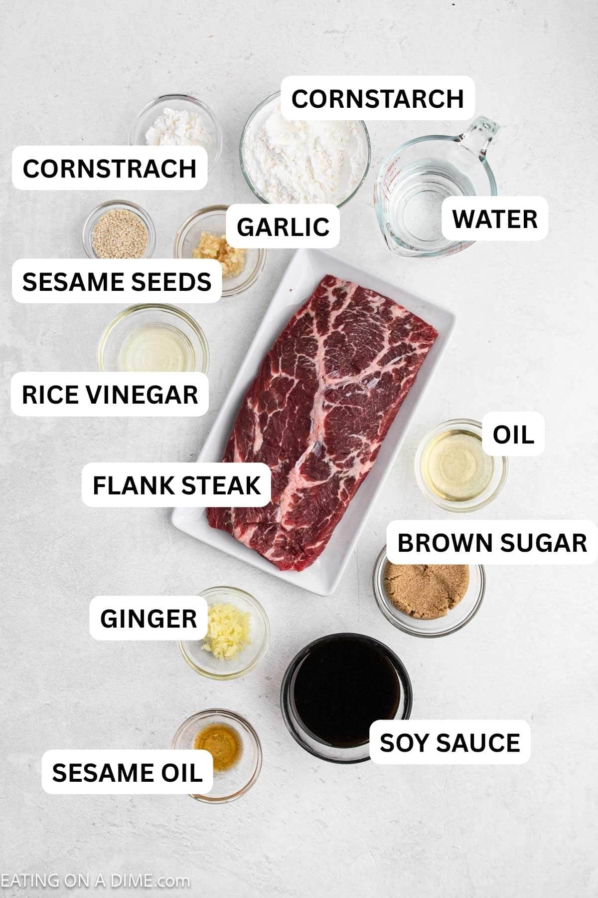 Ingredients needed for this recipe which includes flank steak, cornstarch, oil, minced garlic, ginger, sesame oil, soy sauce, brown sugar, and rice vinegar.
