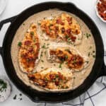 a skillet of smothered chicken