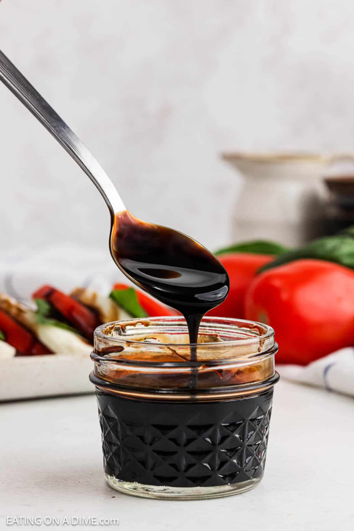 Finished recip in a jar with a serving on the spoon.