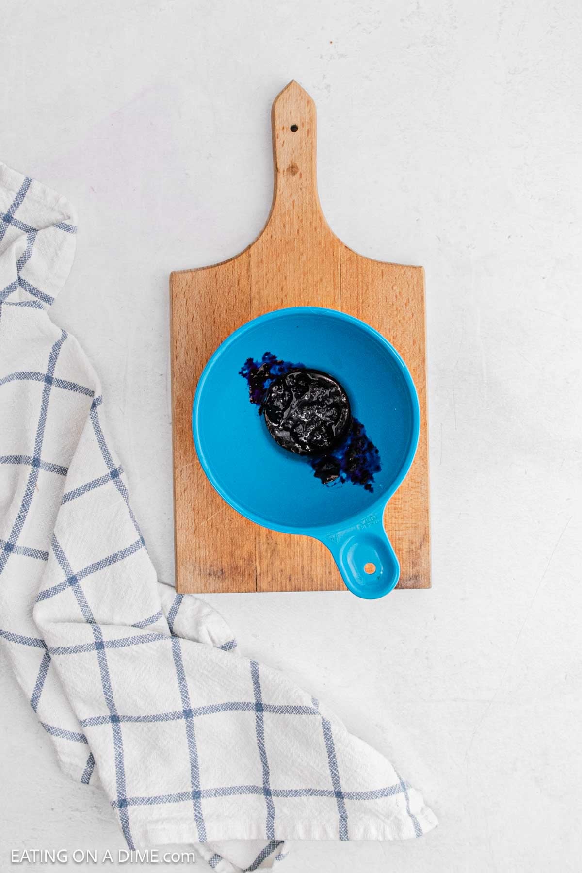 Ready to serve jam in a small blue bowl.