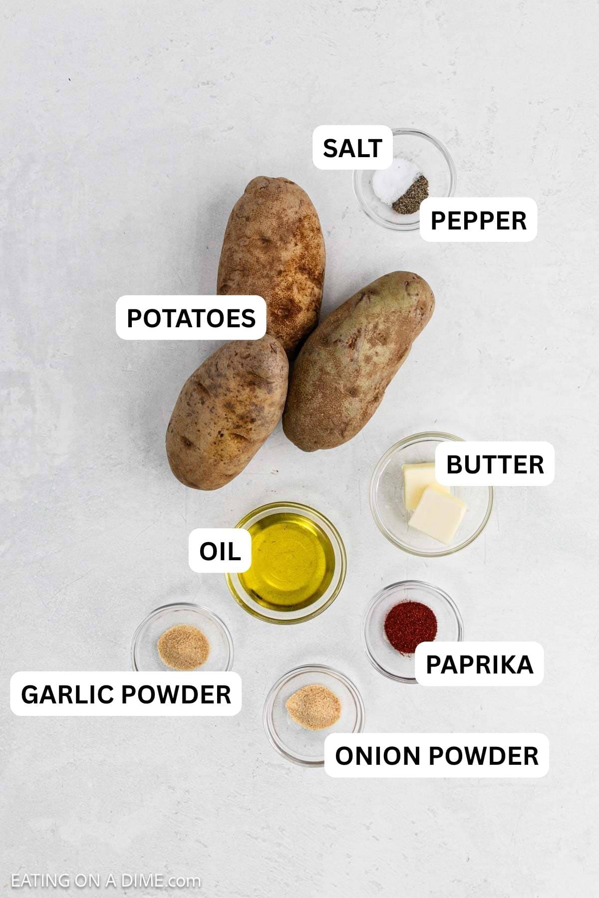 Ingredients needed to make this recipe includes russet potatoes, butter, oil, garlic powder, onion powder, paprika, and salt pepper.