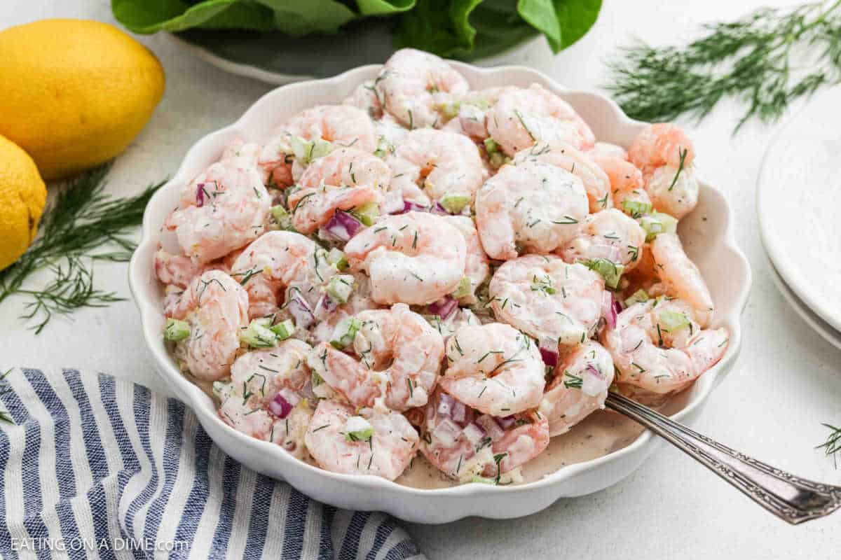 Shrimp Salad coated in a lemon dill dressing in a bowl.