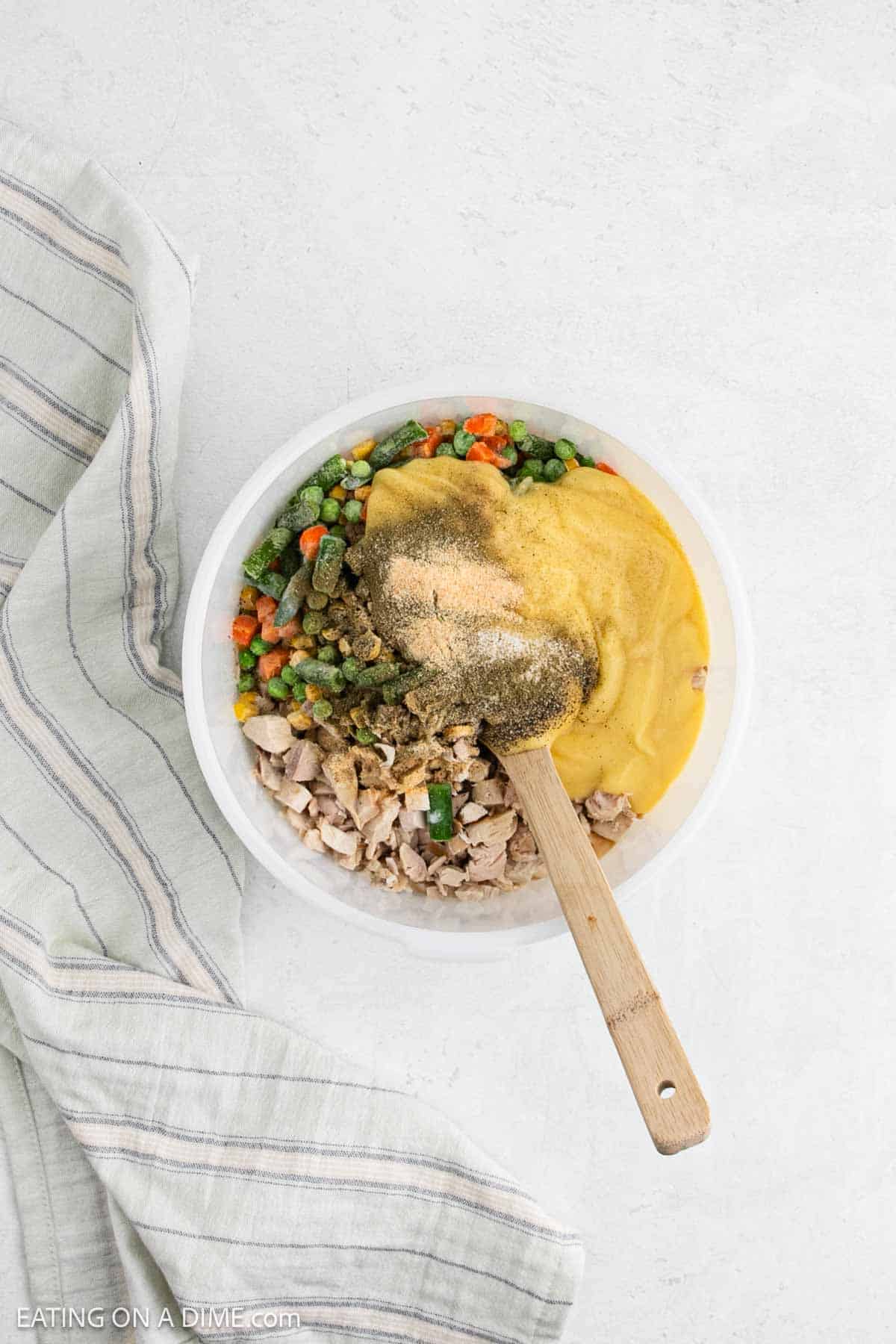 Pot pie filling ingredients combined in a bowl.