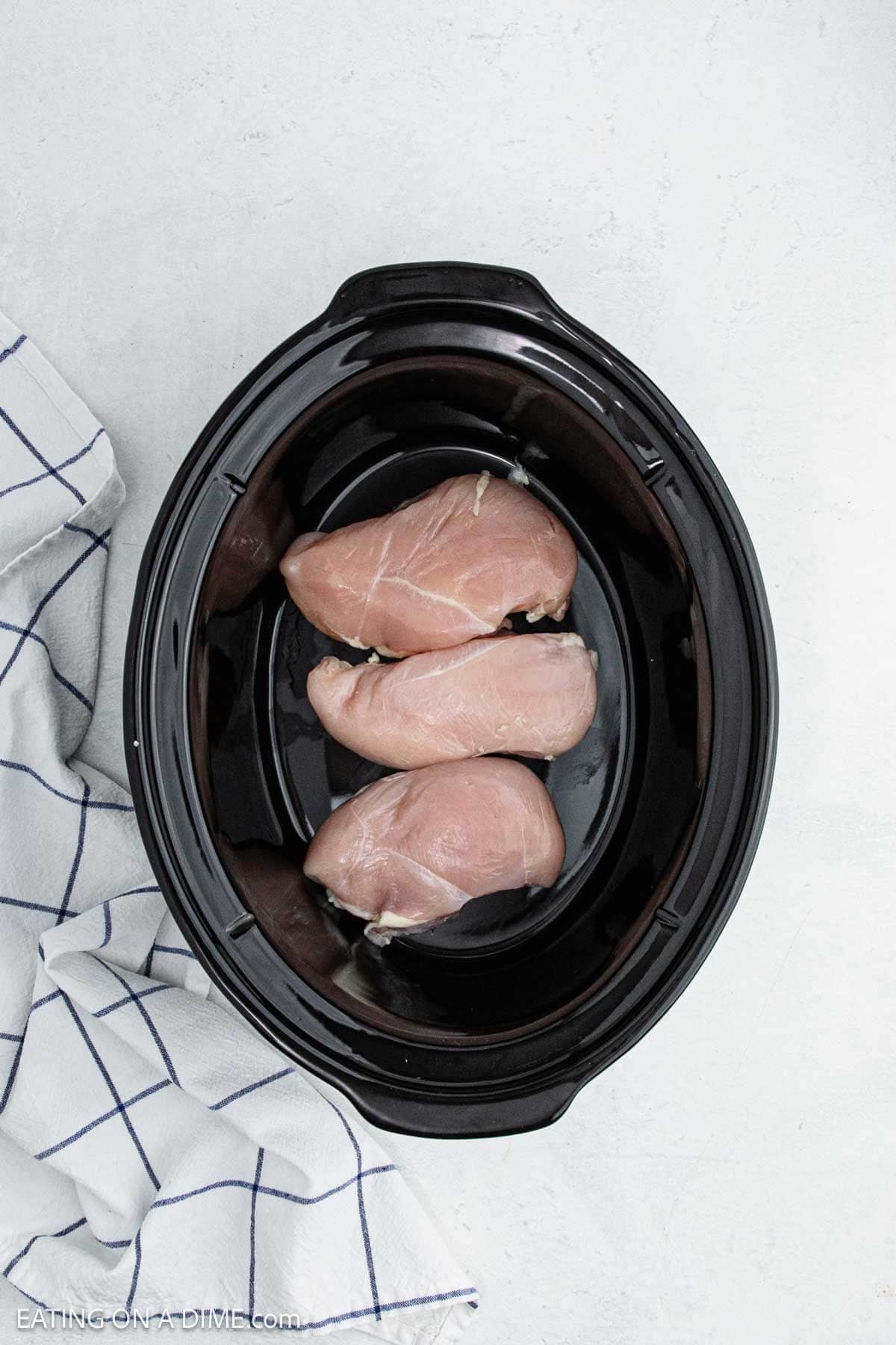 Chicken breasts in the slow cooker.