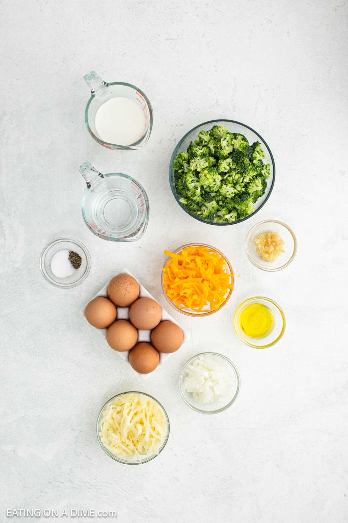 Ingredients needed for this recipe includes eggs, milk, salt, pepper, oil, onion, garlic, broccoli and cheese