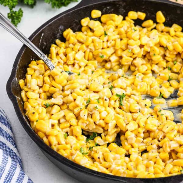 Honey butter skillet corn in a cast iron skillet.