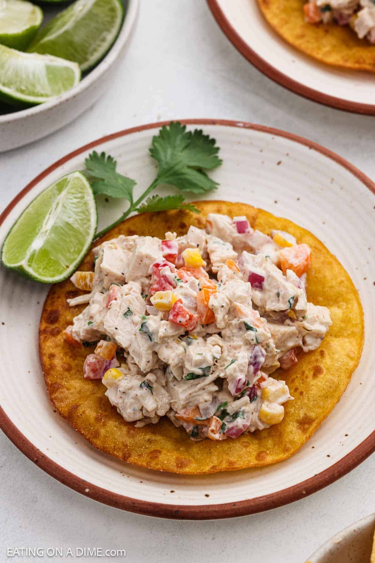 Creamy salad mixture on top of a crispy tostada shell.