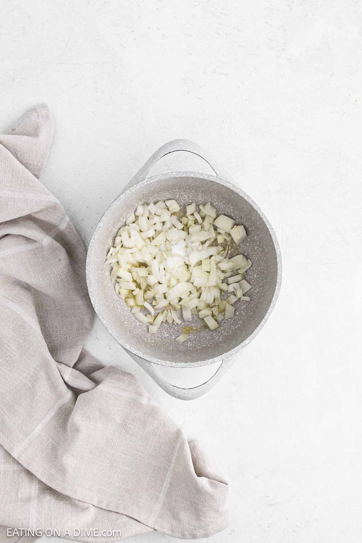 Diced onions in a large pot.