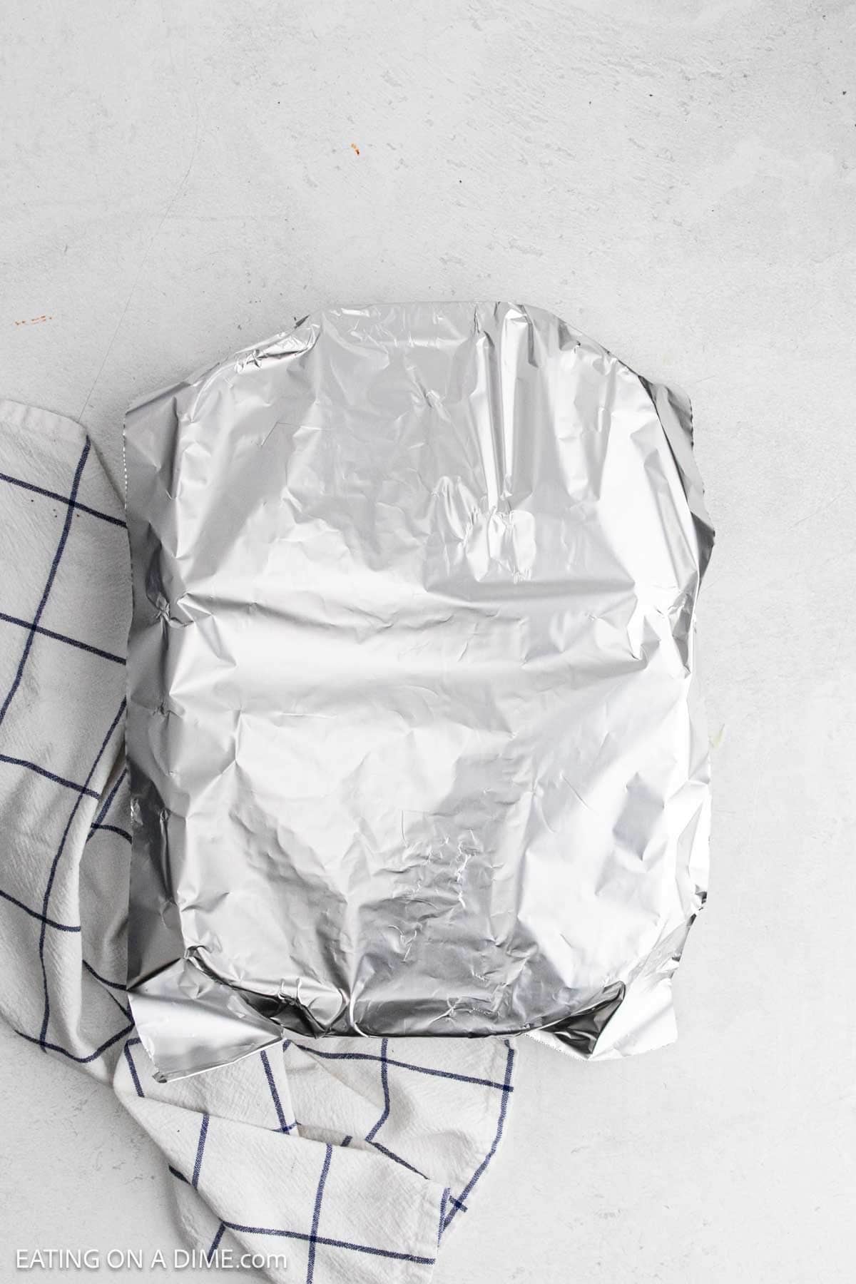 Foil covered a baking dish.