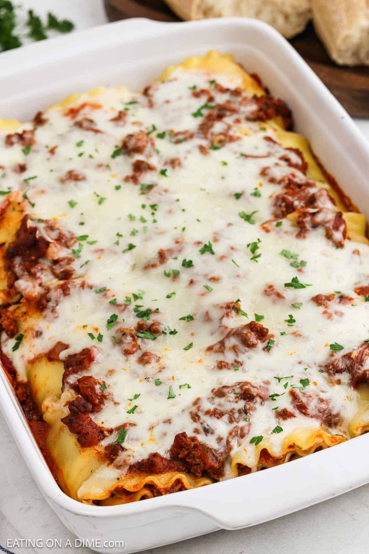 Melted cheese topped the meat sauce and the lasagna noodles in the baking dish.
