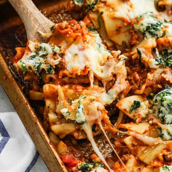 Sheet pan lasagna on a sheet pan ready to serve.