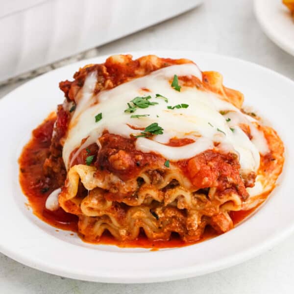 A serving of lasagna rollups on a plate.